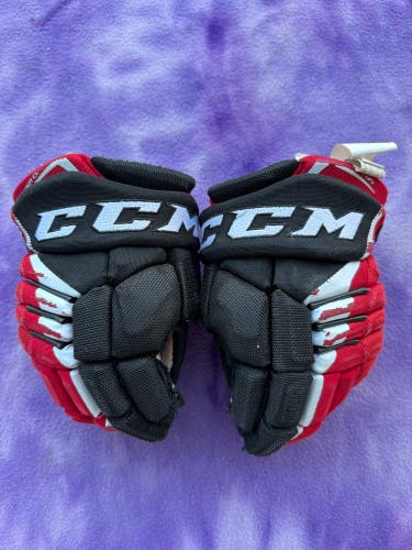 Black Junior CCM JetSpeed FT4 Gloves 11" (Used)