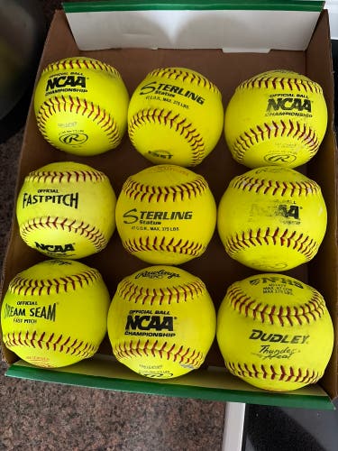 9 Lightly Used 12” Softballs. 6 Rawlings, 2 Sterling,1 Dudley