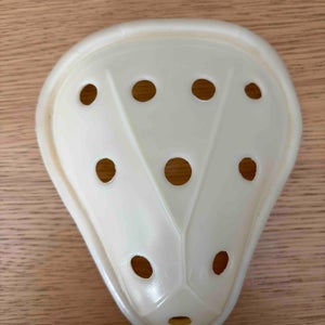 Four adult athletic cups, various brands