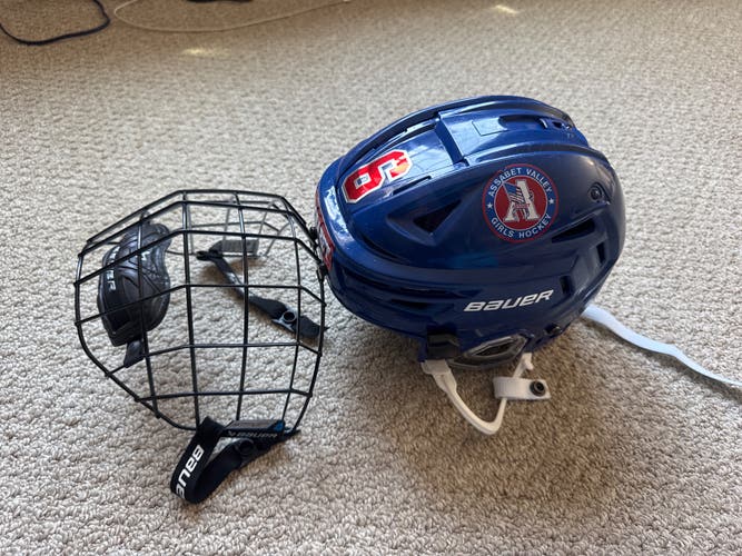 Small Blue Bauer Re-Akt 150 Helmet with Cage
