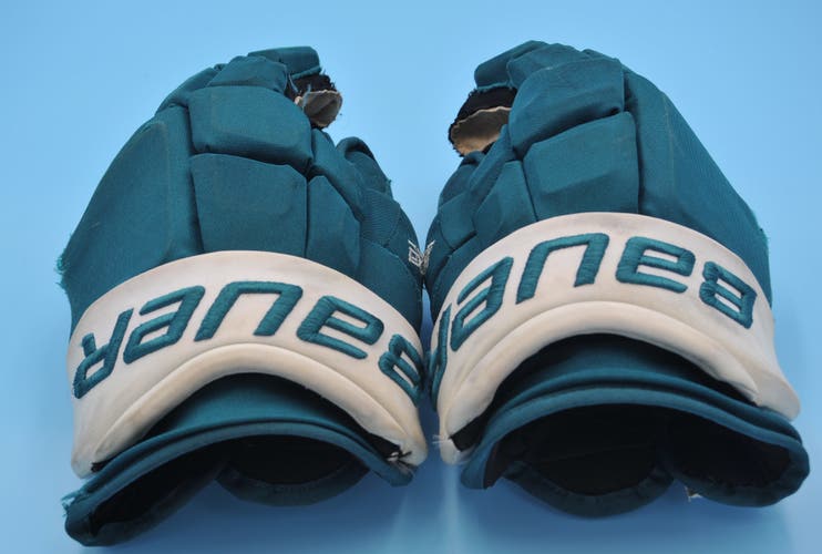 San Jose Sharks Bauer Ultra Sonic 14 “ Teal game used gloves Knyzhov