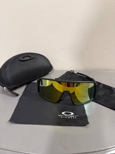 Oakley Sutro Sunglasses. Gold and black
