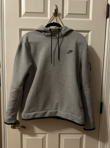 Nike Sportswear Tech Fleece Pullover Hoodie in Dark Grey Heather.