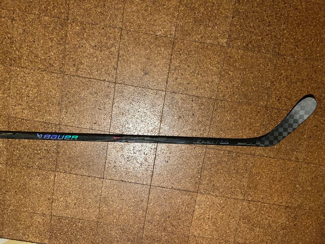 Senior Bauer Vapor Hyperlite (wrapped as Flylite) NCAA game used. LH Hockey Stick 77 Flex pro stock