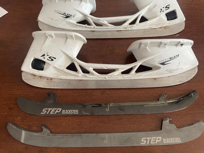 CCM Speedblade XS holders with Stepsteel and Step Blacksteel runners.  size 238