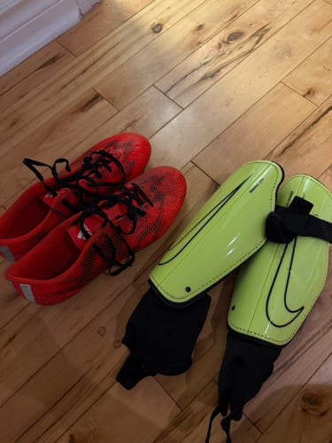Adidas Cleats with Nike shin pads - Orange Unisex Size M 8.5 (W 9.5)