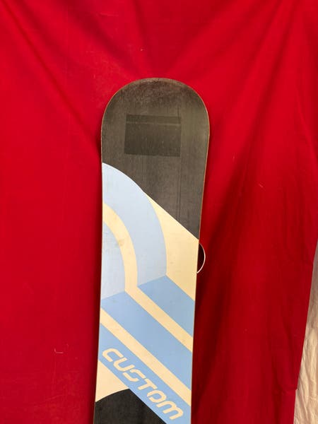 Snowboard: Burton Custom snowboard in red, 154cm. Bindings: K2