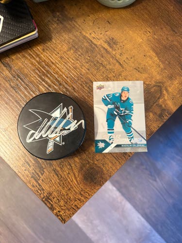 Signed Macklin Celebrini Puck