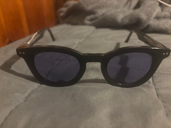 Black jimmy Fairly Unisex Adult Sunglasses with purple lenses (Used)