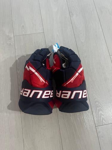 Bauer Vapor Flylite Gloves 14" (New) Navy,red, and white. Two pair bundle