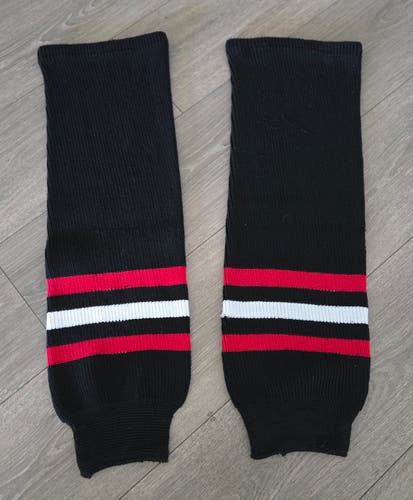 Team Canada black hockey socks w/red & white bands Senior Large (Used)
