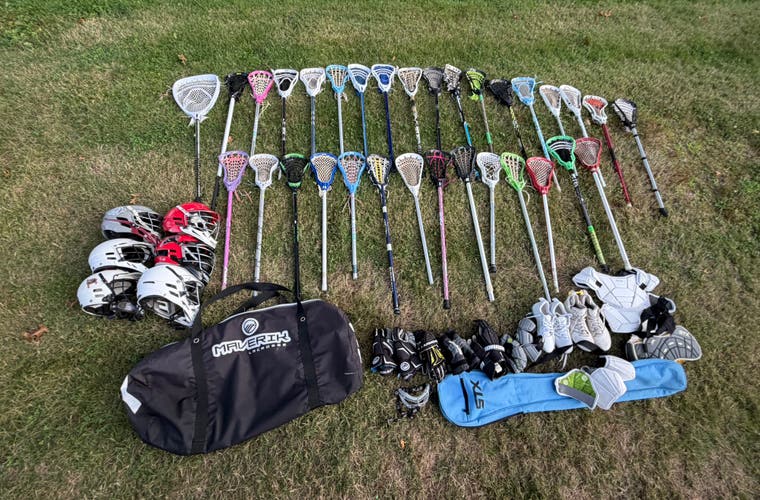 Huge lacrosse gear bundle with 32 sticks, Freeze 4’s, Cascade Helmets, and more! Take all!