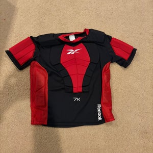 Reebok 7k padded shirt senior large (Used)