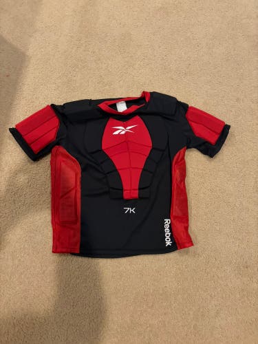 Reebok 7k padded shirt senior large (Used)