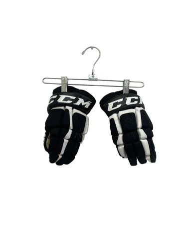 Used CCM U+06 Junior Gloves Black And White 11" 11692-S000155738