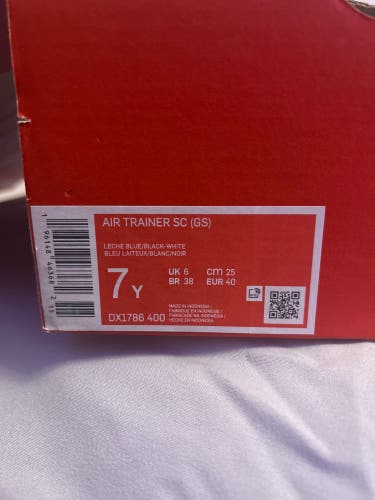Nike Air Trainer SC (GS), size 7Y. (Used, but like new), in the colors blue, black, white, and gray.