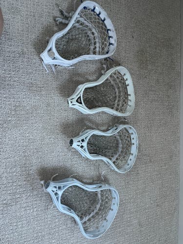 4 used lacrosse heads