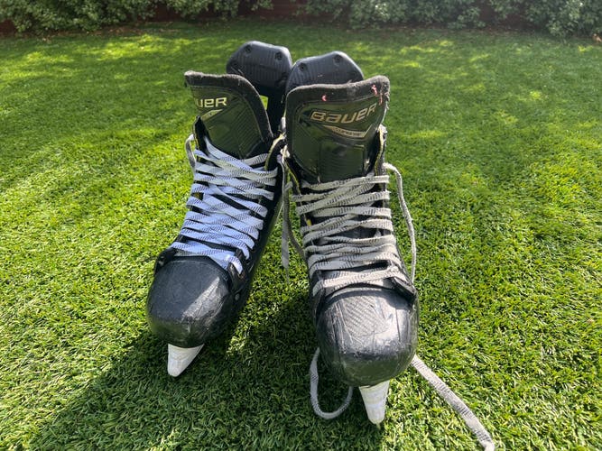 Black 2009 Bauer Supreme Hockey Skates 9 (Used)