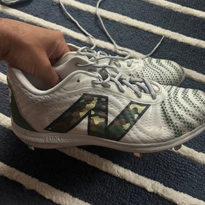 Men's Size M 12.5 (W 13.5) Adult New Balance 4040v7 Low Top Metal (Used)