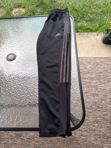 Small / Medium Girls Adidas Pants (Used) black with gray stripes/ zipper legs
