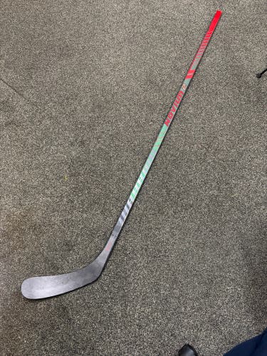 Intermediate Warrior Novium 2 Pro Right Handed Hockey Stick Toe Pattern 65 Flex Pro Stock (Used)