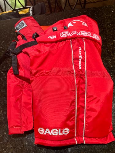 Men's Senior Red Size 46 Eagle X95 Hockey Pants (Used) excellent condition.