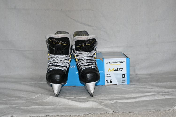 Bauer Supreme M40 Hockey Skates Regular Width Size 1.5 + Extra Steel + Skate Guards (Used)