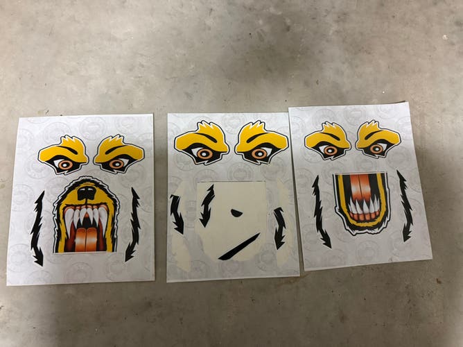 Yellow wolf hockey goalie helmet stickers