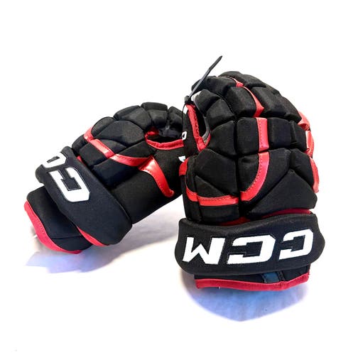 New 13” CCM HG12 Pro Stock Gloves - Chicago Blackhawks