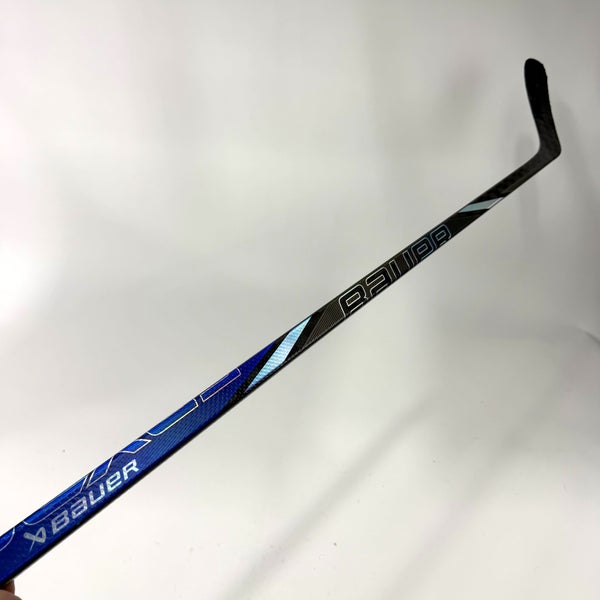 Used Left Blue/Silver Bauer Nexus Tracer | 55 Flex P88 Curve Grip | AB694