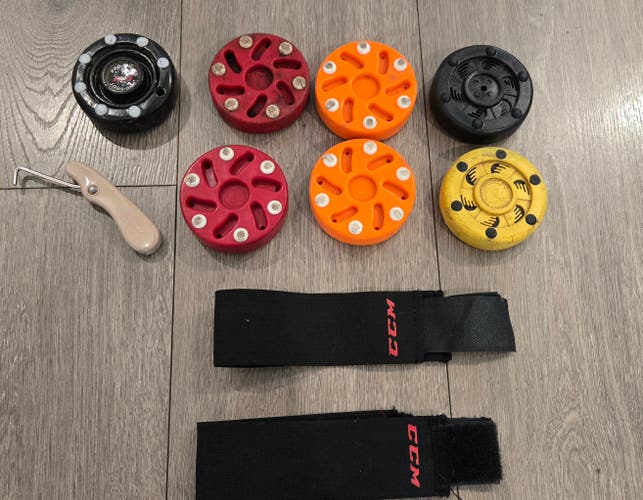 Roller hockey pucks (7) and accessories!