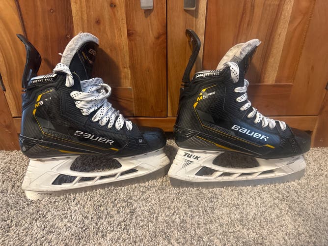 Black/Yellow 2022 Bauer Supreme M5 Pro Hockey Skates senior 7 Fit 1 (used)