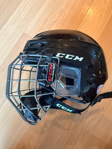 CCM Tacks 310 Helmet combo with fase cage   size small