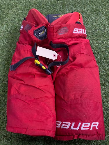 Red Junior Large Bauer Supreme Ultrasonic Hockey Pants (Used)