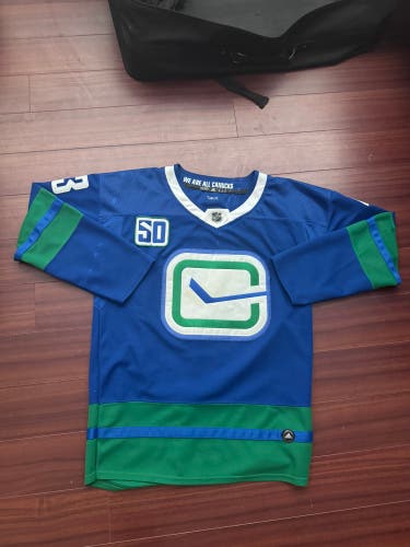 Canucks Quinn Hughes replica jersey