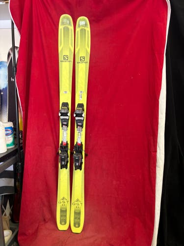 Skis: Neon-yellow/lime green Salomon QST 85 all-mountain skis, 169 cm
Bindings: Marker (grip walk)
B
