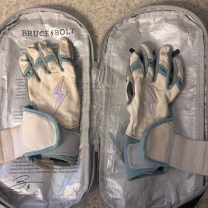 Bruce Bolt chrome series white baby blue long cuff batting gloves.