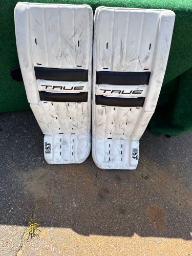 White & Black Intermediate True L87 Goalie Leg Pads (Used) | 31”+2”