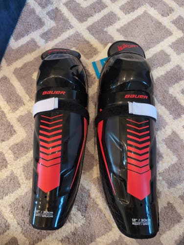 Brand new lil sport shin pads size 12 inch