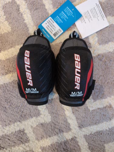 Brand New Bauer little sport elbow pads size M/M