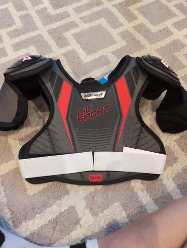 Brand new Bauer little sport shoulder pads size youth medium