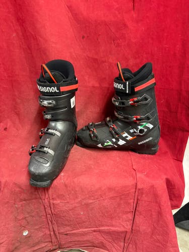 . Skis Boots: Rossignol Speed 120 alpine ski boot with four adjustable buckles and a red power strap