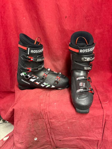 Ski Boots: Rossignol Speed 120 alpine ski boot with four adjustable buckles and a red power strap.