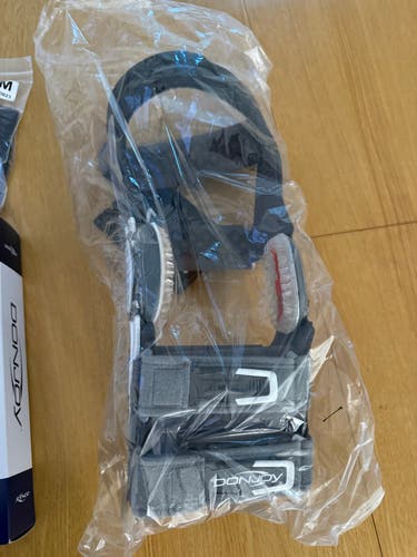 (New) DonJoy A22 Titanium custom knee brace for the right knee
