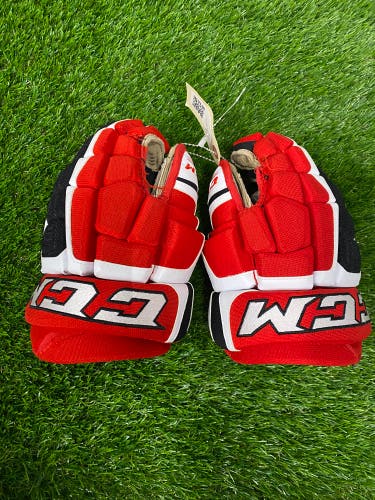 Red Junior CCM U+ 12 Gloves 12" (Used)