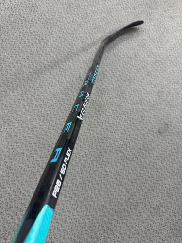 Junior Bauer Teal Nexus Tracer Left Hand Hockey Stick P28 50 Flex (New)