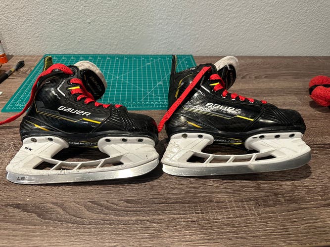 Black/Yellow Bauer Supreme M5 Pro Hockey Skates Regular Width 13.5 (Used)