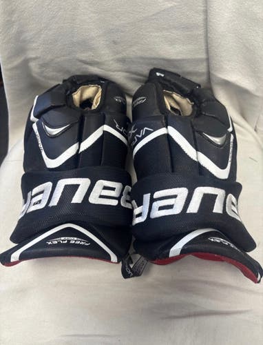 Senior size 15 inch Bauer vapor X 7.0 ice hockey player gloves. Excellent Cond.