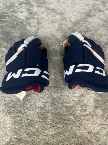 Blue Junior CCM Next Gloves 10" (Used)