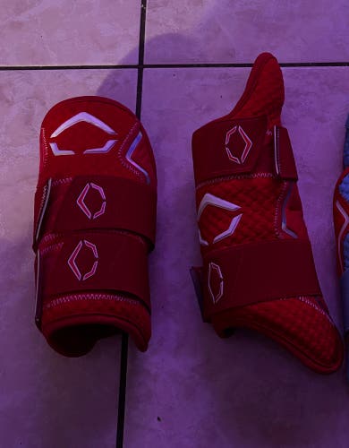 Red Evoshield leg guard and elbow guard